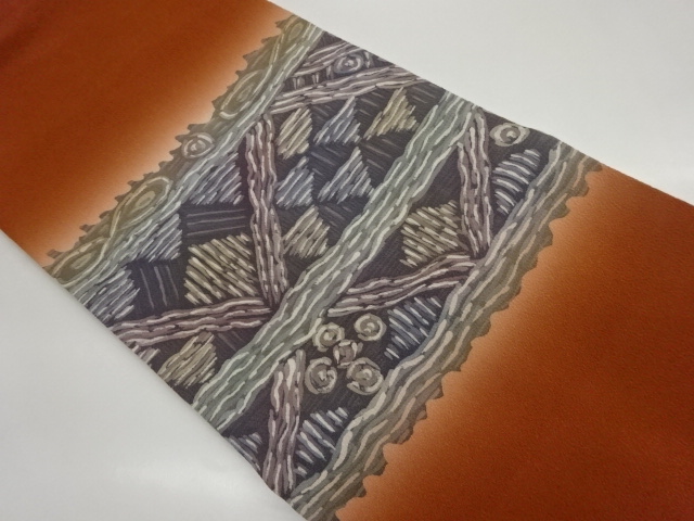 作家物　縮緬地幾何学模様名古屋帯